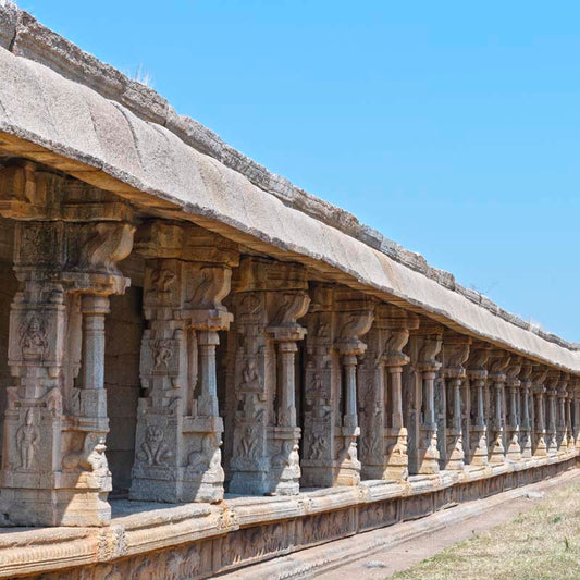 Journey Through Time: Pillars of Elegance at Vijay Vitthala Temple, Hampi (with Frame)