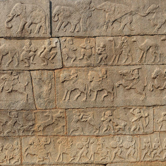 Hampi - Stories carved in stone near Mahanavmi Dibba. A Unesco World Heritage Site (with Frame)