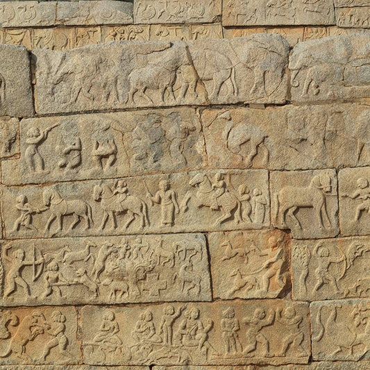 Hampi - Stories carved in stone near Mahanavmi Dibba. A Unesco World Heritage Site (with Frame)