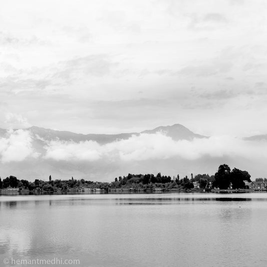 Srinagar - Nageen Lake. Nigeen Lake is a mildly eutrophic lake located in Srinagar, Jammu and Kashmir, India. It is sometimes considered a part of the Dal lake and is connected to it via a narrow strait. (_MG_5245 Srinagar) This Fine Art Photograph is printed on Canvas.