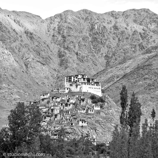 Ladakh - Monastery at Leh. Ladakh is most famous for breathtaking landscapes, the crystal clear skies, the highest mountain passes, thrilling adventure activities, Buddhist Monasteries and festivals. (_MG_6018 Ladakh) This Fine Art Photograph is printed on Canvas. Available in 9x9 inches, 12x12 inches and 24x24 inches. Customised sizes are also available on request. Frame Photo shown is for viewing reference only.
