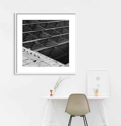 Step well carved in a stone. Hampi, a World Heritage Site situated in Karnataka, India. (0132) This is located at Mahanavmi Dibba, Hampi. Indian Heritage, Art and Culture. A beautiful composition of the steps, pattern and beautiful play of light and shadows. This Fine Art Photograph is printed on Canvas. Fine Art Photography on Canvas Printing Indian Temples Fine Art Culture Carving Stone Black and White black&white B&W World Heritage Site BW Hampi