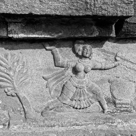 Dancing Lady carved in a stone. (0143) Hampi, a World Heritage Site situated in Karnataka, India. This is located at Mahanavmi Dibba, Hampi. Indian Heritage, Art and Culture. This Fine Art Photograph is printed on Canvas. Available in 9x9 inches, 12x12 inches and 24x24 inches. Customised sizes are also available on request. Fine Art Photography on Canvas Printing Indian Temples Fine Art Culture Carving Stone Black and White black&white B&W World Heritage Site BW Hampi