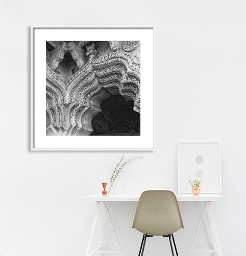 Arch clouse-up at Lotus Mahal. (0390Hampi) Hampi, a World Heritage Site situated in Karnataka, India. This is located at Hemkuta, Hampi. Indian Heritage, Art and Culture. This Fine Art Photograph is printed on Canvas. Available in 9x9 inches, 12x12 inches and 24x24 inches. Customised sizes are also available on request. Fine Art Photography on Canvas Printing Indian Temples Fine Art Culture Carving Stone Black and White black&white B&W World Heritage Site BW Hampi