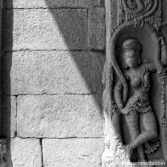 Stone Carved Lady (Shalbhanjika) at the entrance of a temple. Hampi, a World Heritage Site situated in Karnataka, India. Indian Heritage, Art and Culture. (0501Hampi) Fine Art Photography on Canvas Printing Indian Temples Fine Art Culture Carving Stone Black and White black&white B&W World Heritage Site BW Hampi