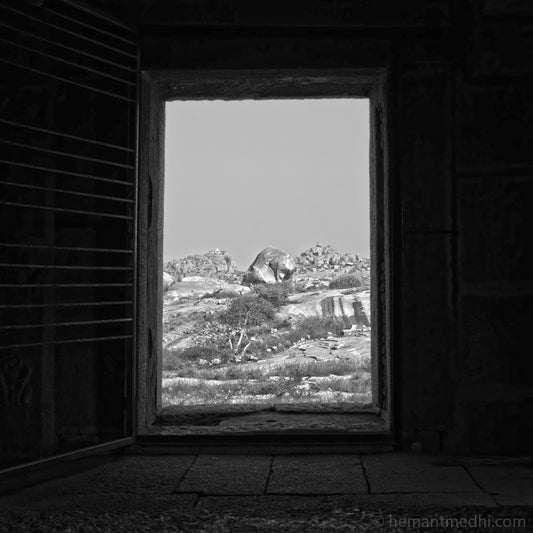 Landscape from inside the Temple in Hampi. (A_6121156 Hampi) A World Heritage Site situated in Karnataka, India. A Unesco World Heritage Site. Indian Heritage, Art and Culture. Fine Art Photography on Canvas Printing Indian Temples Fine Art Culture Carving Stone Black and White black&white B&W World Heritage Site BW Hampi