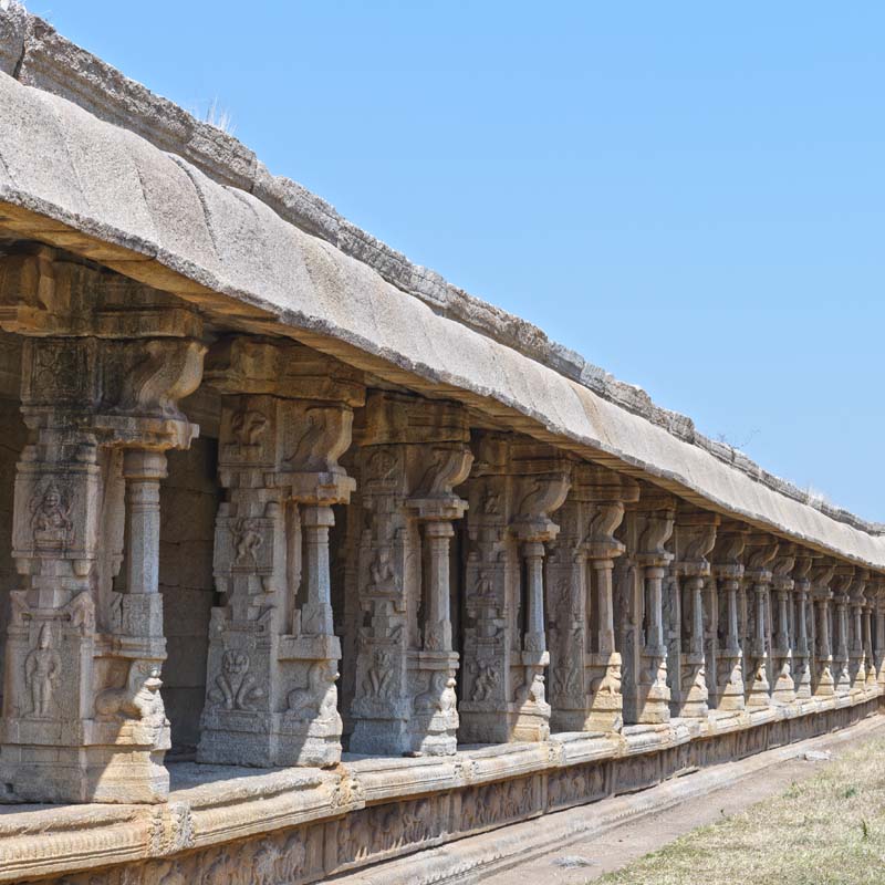 Journey Through Time: Pillars of Elegance at Vijay Vitthala Temple, Hampi (with Frame)