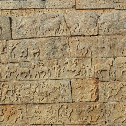 Hampi - Stories carved in stone near Mahanavmi Dibba. A Unesco World Heritage Site (with Frame)