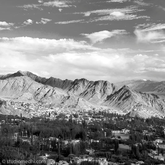 Ladakh - Leh City. Ladakh is most famous for breathtaking landscapes, the crystal clear skies, the highest mountain passes, thrilling adventure activities, Buddhist Monasteries and festivals. (Leh Pan 8)   This Fine Art Photograph is printed on Canvas.