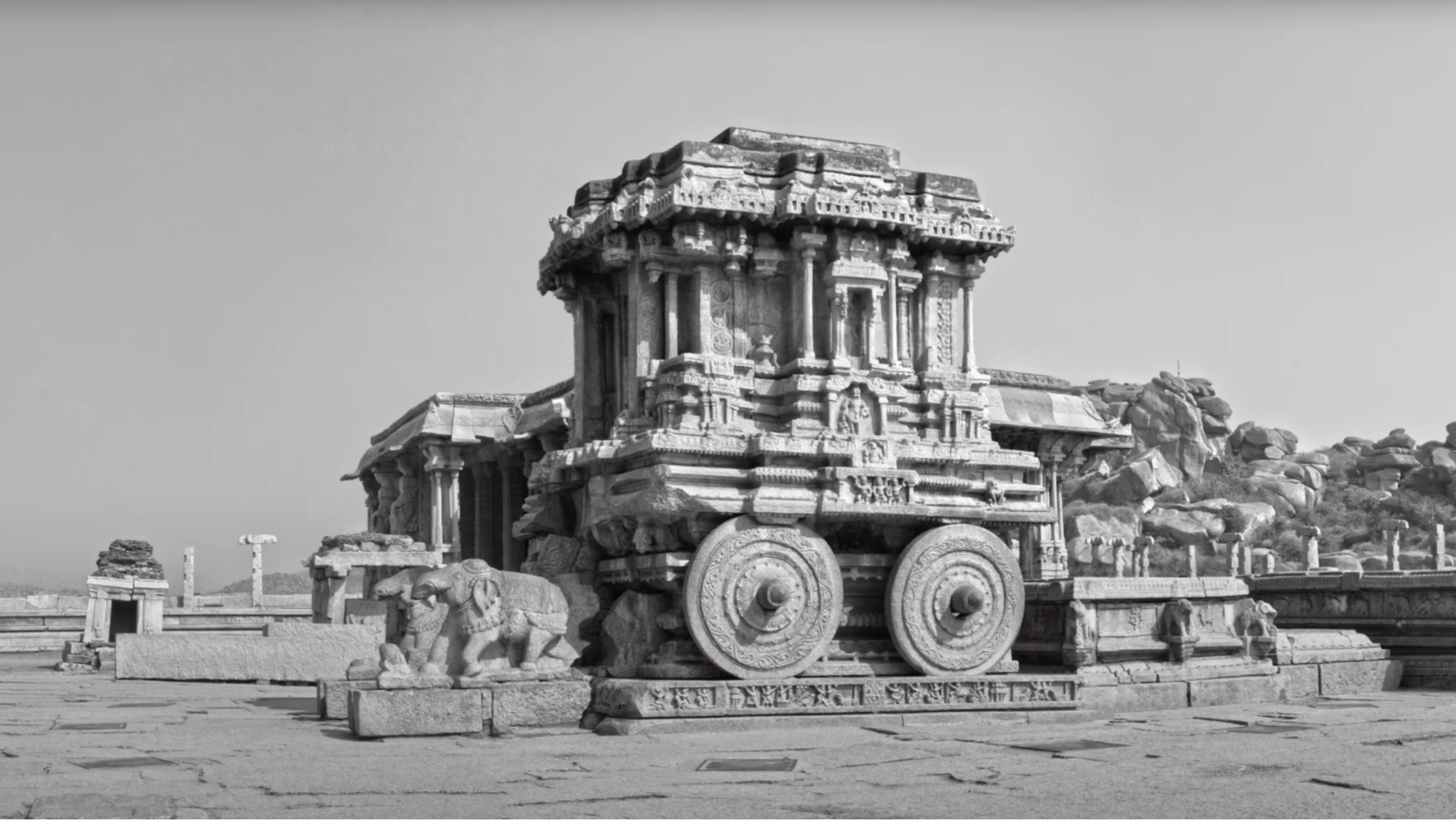 Load video: The Stone Chariot at the Vitthal Temple in Hampi, Karnataka, is one of the most iconic symbols of India’s rich architectural heritage. Built in the 16th century during the reign of King Krishnadevaraya of the Vijayanagara Empire, this intricately carved granite structure resembles a temple chariot and was dedicated to Garuda, the mythical vehicle of Lord Vishnu. Though made of stone, the chariot&#39;s wheels were once capable of rotating, showcasing the exceptional craftsmanship of the time. Set within the grand Vitthal Temple complex, the Stone Chariot reflects the artistic and spiritual grandeur of the Vijayanagara period and stands today as a part of the UNESCO World Heritage Site at Hampi, admired for its beauty, symmetry, and historical significance.Background Music by bensound.com