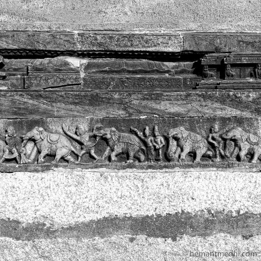 Elephants Stone Carving Pattika at Hampi. (0145Hampi) A World Heritage Site situated in  Karnataka, India. This is located at Mahanavmi Dibba, Hampi. Indian Heritage, Art and Culture. A beautiful composition of the Elephant, pattern and beautiful play of light and shadows. Fine Art Photography on Canvas Printing Indian Temples Fine Art Culture Carving Stone Black and White black&white B&W World Heritage Site BW Hampi 
