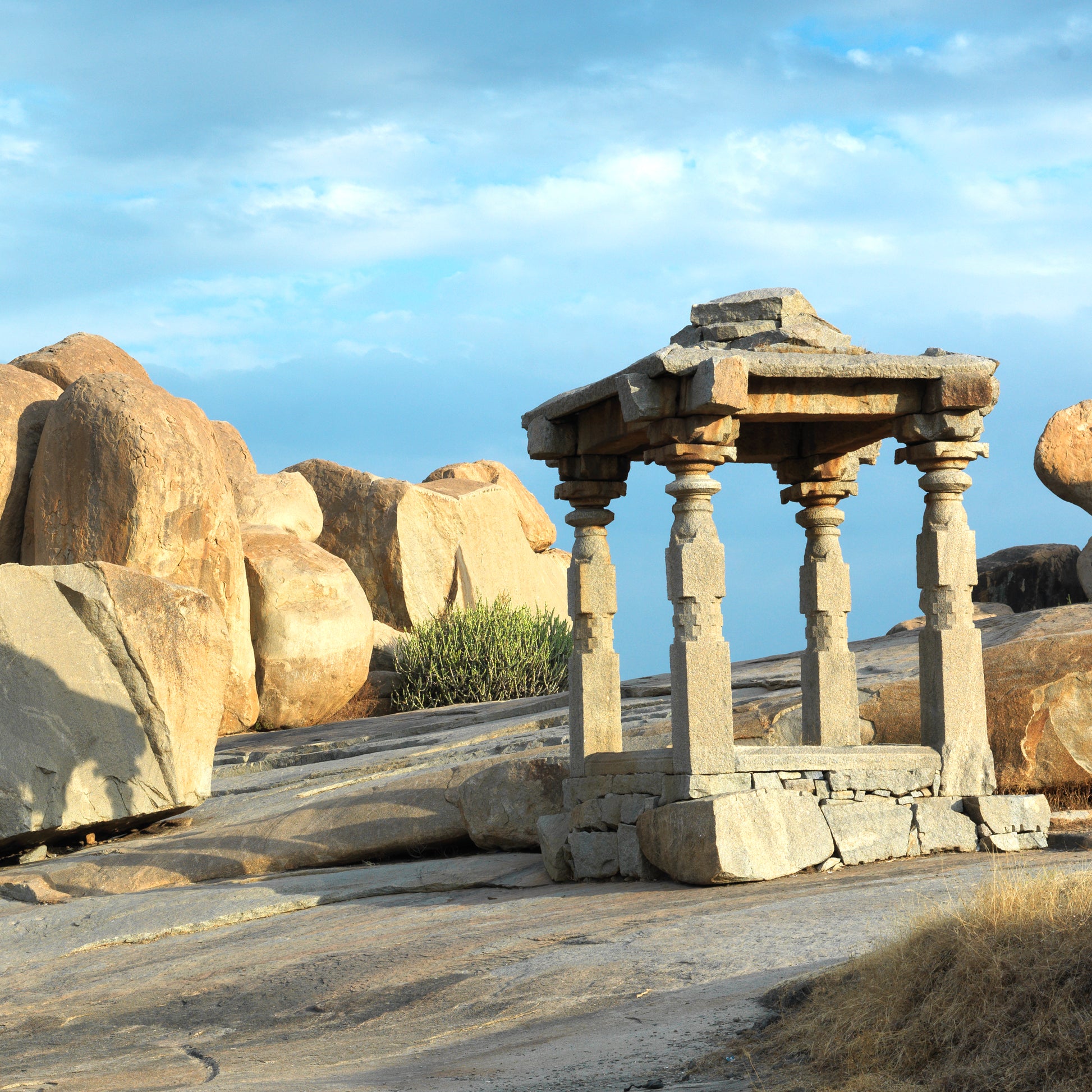 Stone structure on Hemakuta. Hampi. (A_6121223HampiCol) A World Heritage Site situated in  Karnataka, India. This is located at Hemakuta, Hampi. A Unesco World Heritage Site.  Indian Heritage, Art and Culture.   This Fine Art Photograph is printed on Canvas.